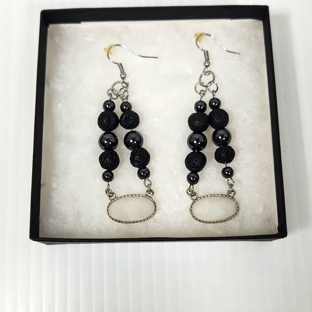 Earings, hematite, quartz, and lava